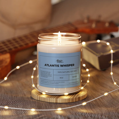 9oz Atlantis Whisper Soy Candle on wooden table with coastal decor