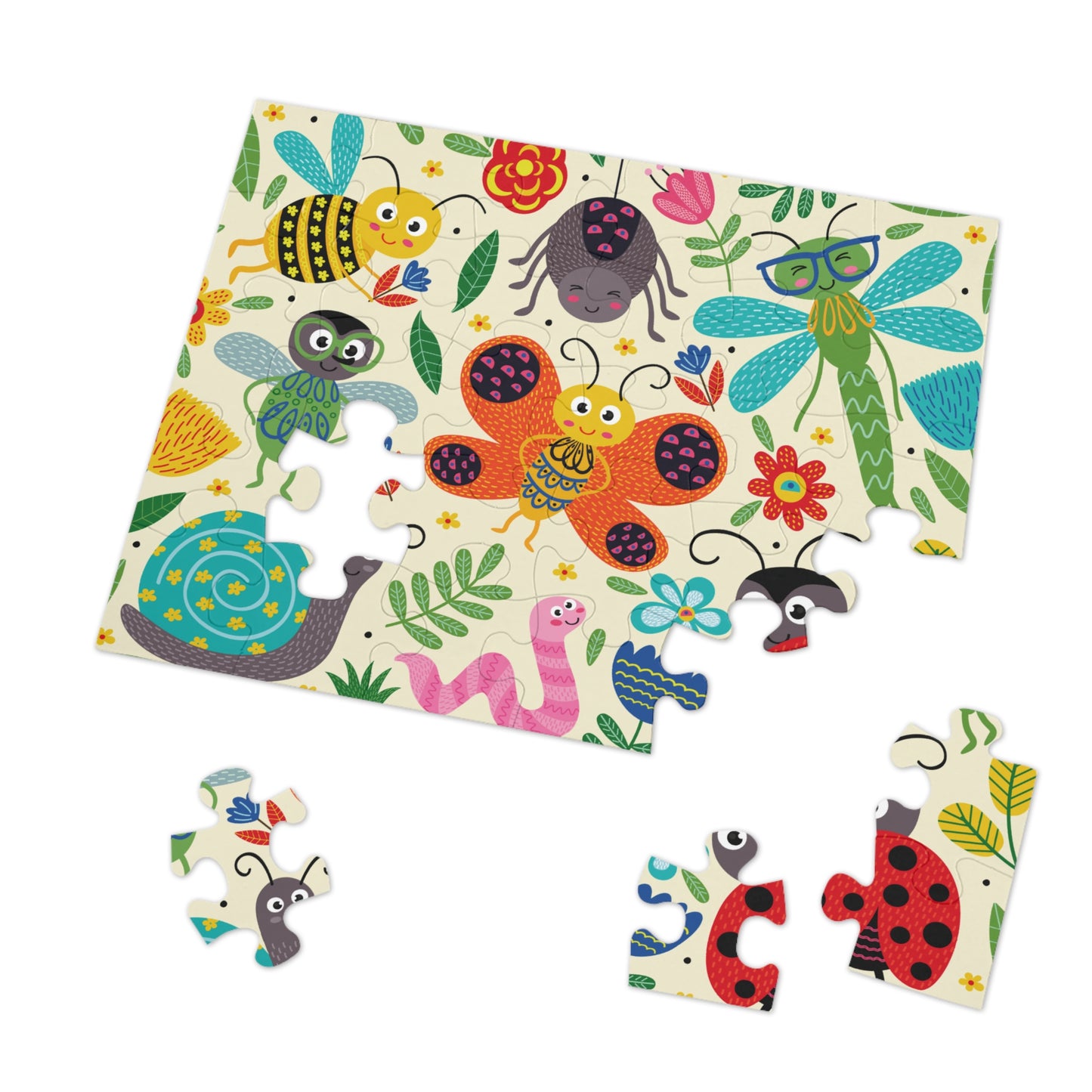 Bright puzzle pieces featuring smiling caterpillars, butterflies, bees, and ladybugs