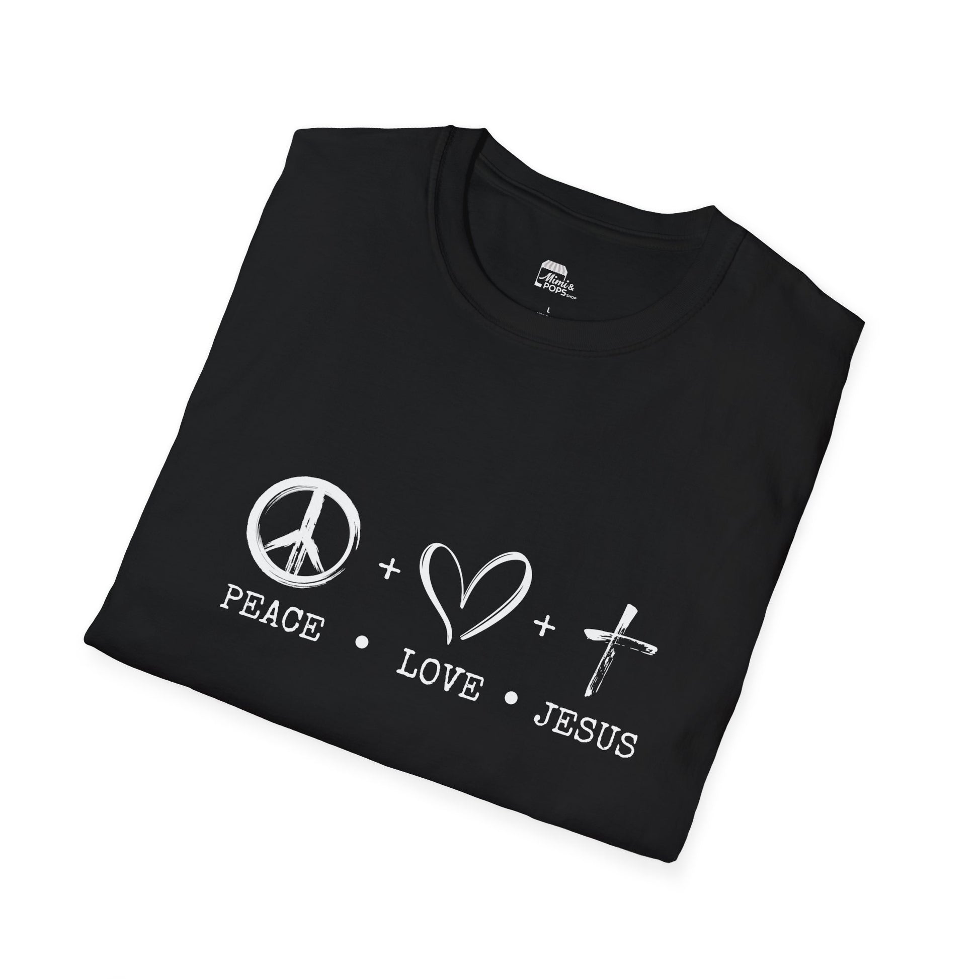 Close-up of white 'Child of God' distressed lettering on black soft cotton fabric