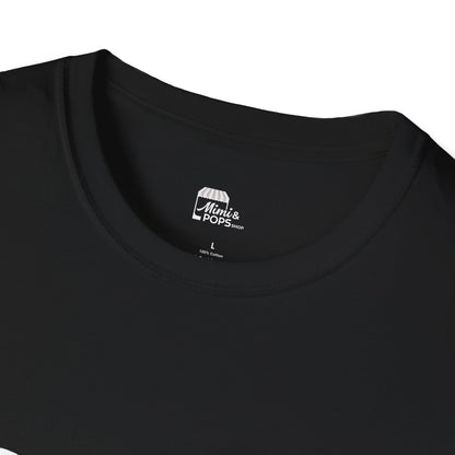Close-up of white 'Child of God' distressed lettering on black soft cotton fabric
